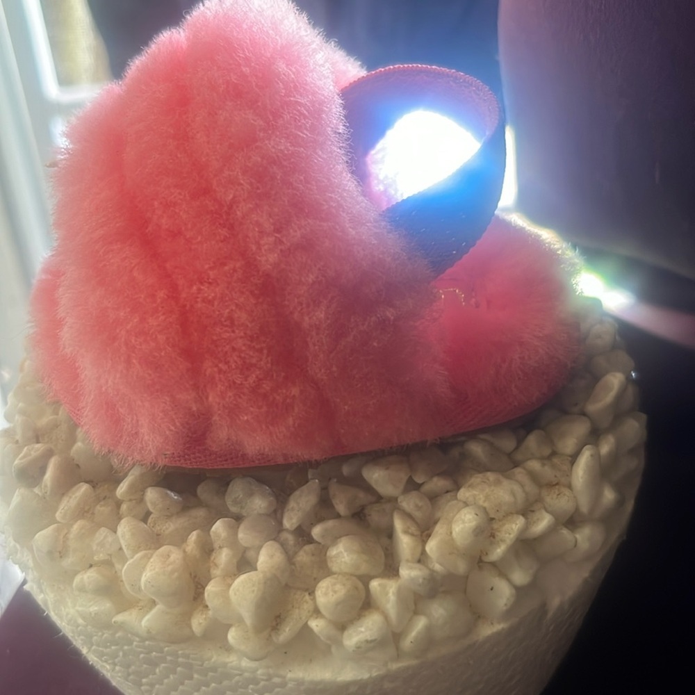 Baby UGG slipper. Size 1. Babu only wore them once for pictures.